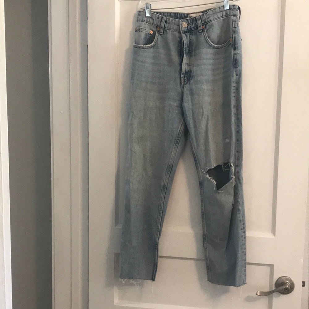 Zara high rise, ripped, straight leg jeans. Size 6. Hole is distressed